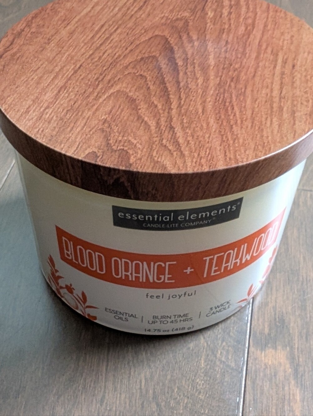 essential elements Blood Orange + Teakwood 3-Wick Candle - Orange and Brown